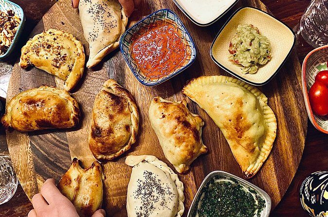 Buenos Aires Food Tour: Local Dishes, Steak, Empanada & More - Drink Stop and Neighborhood Stories: Evita Perón and the Cultural Thread