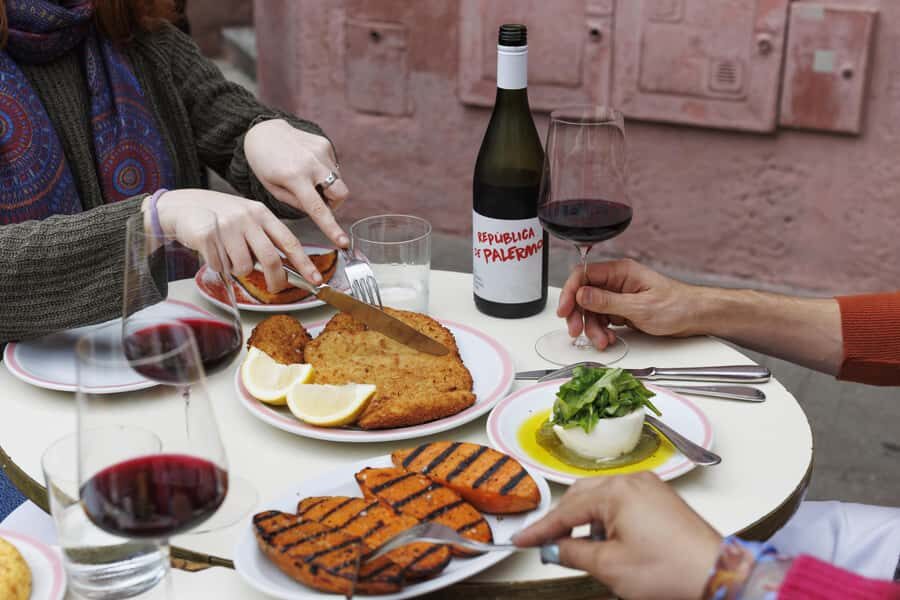 Buenos Aires: Local Foodie Adventure with Sherpa Food Tours - Stop 1: Hole-in-the-Wall Deli Empanadas and Local Favorites