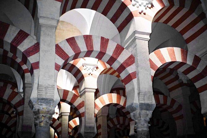 Cordoba Monuments Intensive Tour in English Tickets included - The Judería stroll: Lovers, Maimonides, and the street to the Synagogue