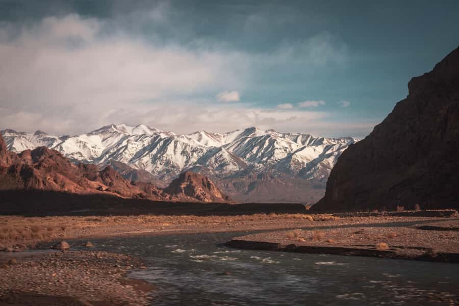 Mendoza: High Mountain and Aconcagua Park Tour with BBQ - Puente del Inca: a quick stop with heavy historical weight